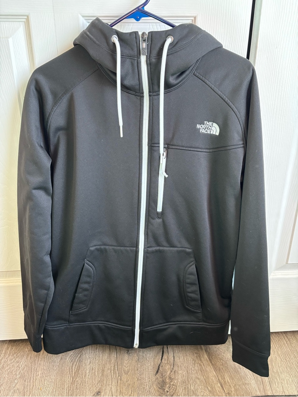 The North Face Black Hoodie with White Drawstrings